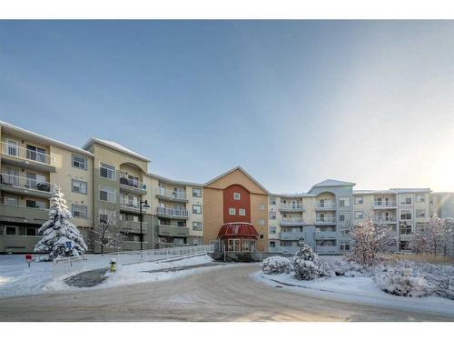 2106-700 Willowbrook Road Nw, Airdrie, AB - Outdoor With Balcony With Facade