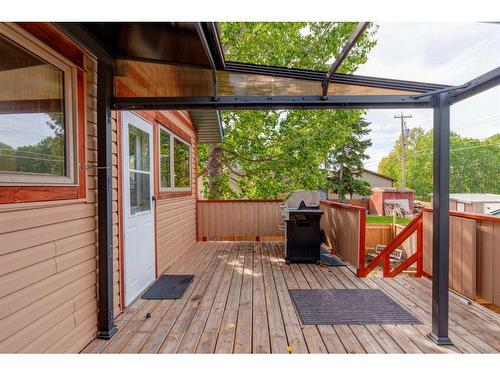 612 Main Street, Diamond Valley, AB - Outdoor With Deck Patio Veranda With Exterior