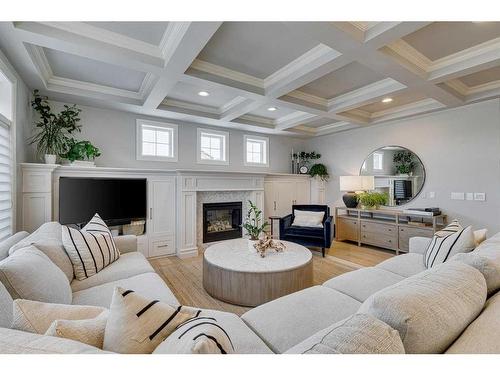 432 Discovery Ridge Bay Sw, Calgary, AB - Indoor Photo Showing Living Room With Fireplace