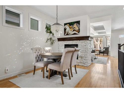 2423 33 Street Sw, Calgary, AB - Indoor Photo Showing Dining Room With Fireplace