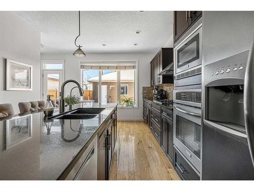 2423 33 Street Sw, Calgary, AB - Indoor Photo Showing Kitchen With Double Sink