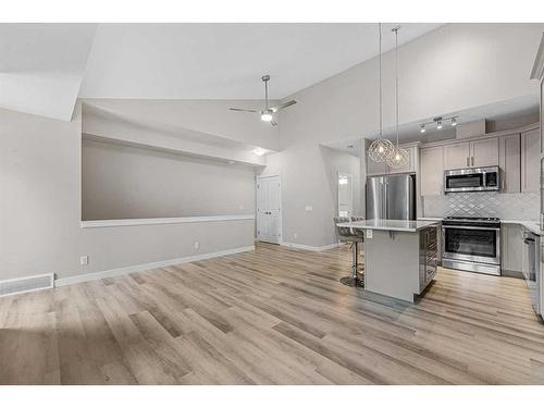 1005 Cranbrook Walk Se, Calgary, AB - Indoor Photo Showing Kitchen With Stainless Steel Kitchen With Upgraded Kitchen