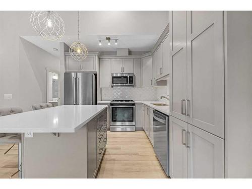 1005 Cranbrook Walk Se, Calgary, AB - Indoor Photo Showing Kitchen With Stainless Steel Kitchen With Upgraded Kitchen