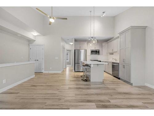 1005 Cranbrook Walk Se, Calgary, AB - Indoor Photo Showing Kitchen With Upgraded Kitchen