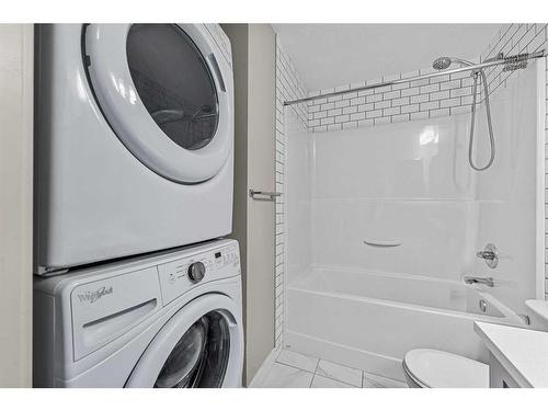 1005 Cranbrook Walk Se, Calgary, AB - Indoor Photo Showing Laundry Room