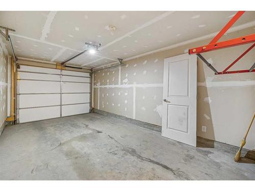 1005 Cranbrook Walk Se, Calgary, AB - Indoor Photo Showing Garage