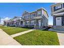 604 Dawson Drive, Chestermere, AB  - Outdoor With Deck Patio Veranda With Facade 