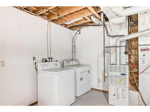 489 Country Hills Drive Nw, Calgary, AB - Indoor Photo Showing Laundry Room