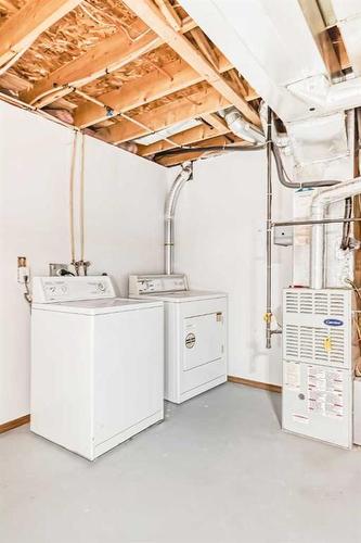 489 Country Hills Drive Nw, Calgary, AB - Indoor Photo Showing Laundry Room