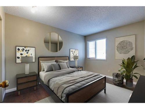 53 Shawnee Rise Sw, Calgary, AB - Indoor Photo Showing Bedroom