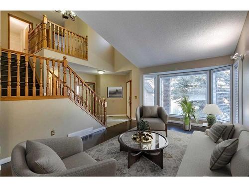 53 Shawnee Rise Sw, Calgary, AB - Indoor Photo Showing Living Room