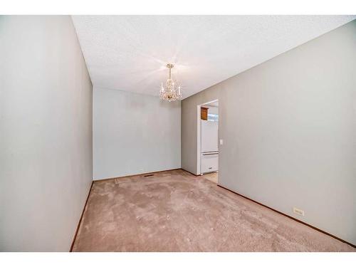 104 Brazeau Crescent Sw, Calgary, AB - Indoor Photo Showing Other Room