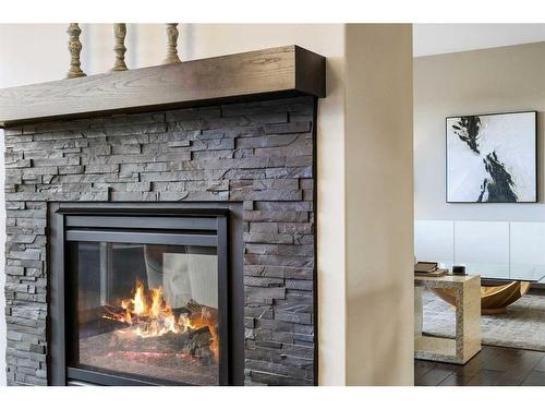 110 Ascot Crescent Sw, Calgary, AB - Indoor Photo Showing Living Room With Fireplace