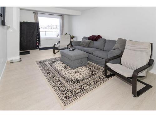 32 Cornerbrook Cove Ne, Calgary, AB - Indoor Photo Showing Living Room