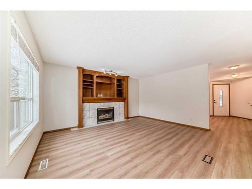 221 Mt Douglas Circle Se, Calgary, AB - Indoor With Fireplace