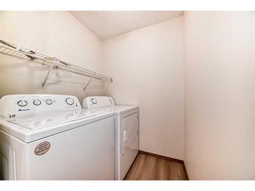 221 Mt Douglas Circle Se, Calgary, AB - Indoor Photo Showing Laundry Room