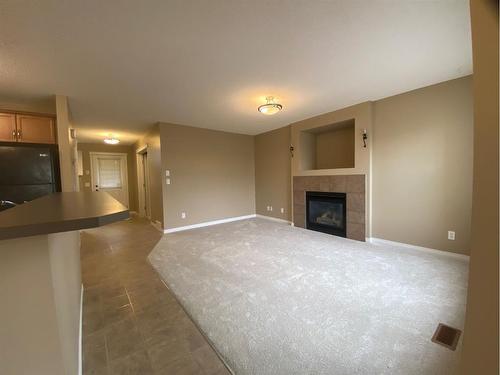 376 Silverado Drive Sw, Calgary, AB - Indoor With Fireplace