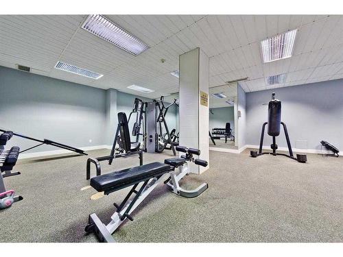 908-4944 Dalton Drive Nw, Calgary, AB - Indoor Photo Showing Gym Room