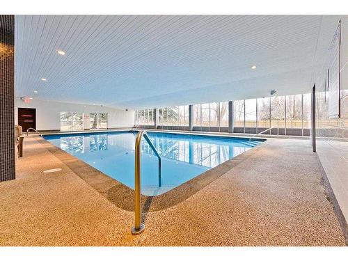 908-4944 Dalton Drive Nw, Calgary, AB -  Photo Showing Other Room With In Ground Pool