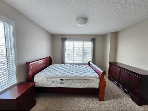 952 Nolan Hill Boulevard Nw, Calgary, AB - Indoor Photo Showing Bedroom