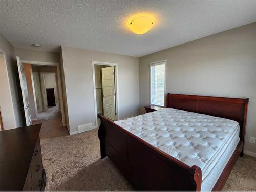 952 Nolan Hill Boulevard Nw, Calgary, AB - Indoor Photo Showing Bedroom