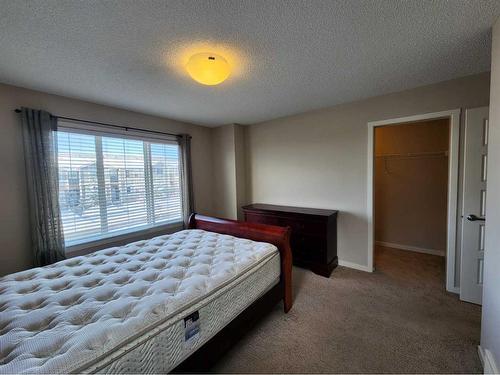 952 Nolan Hill Boulevard Nw, Calgary, AB - Indoor Photo Showing Bedroom