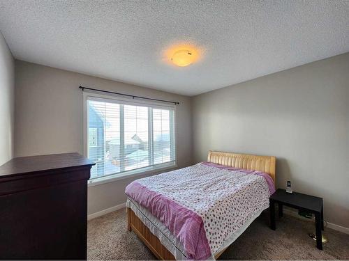 952 Nolan Hill Boulevard Nw, Calgary, AB - Indoor Photo Showing Bedroom