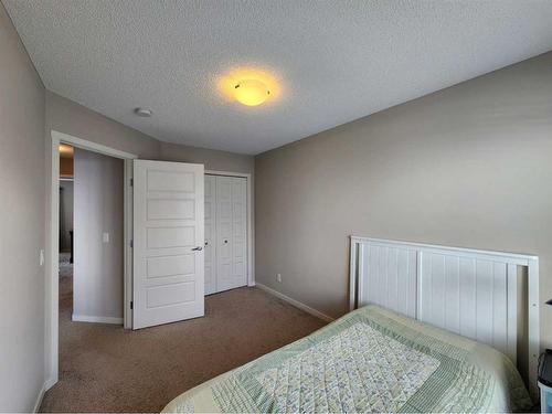 952 Nolan Hill Boulevard Nw, Calgary, AB - Indoor Photo Showing Bedroom