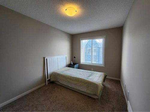 952 Nolan Hill Boulevard Nw, Calgary, AB - Indoor Photo Showing Bedroom