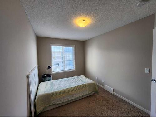 952 Nolan Hill Boulevard Nw, Calgary, AB - Indoor Photo Showing Bedroom