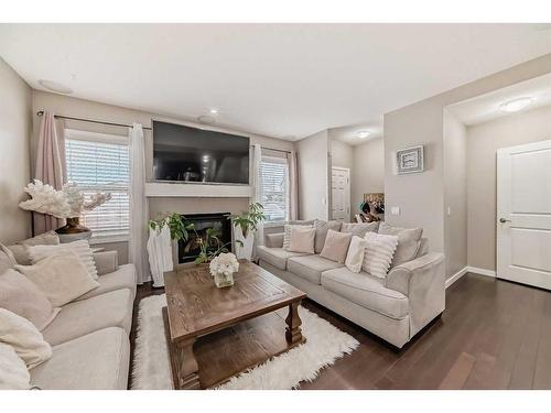 2034 New Brighton Park Se, Calgary, AB - Indoor Photo Showing Living Room With Fireplace