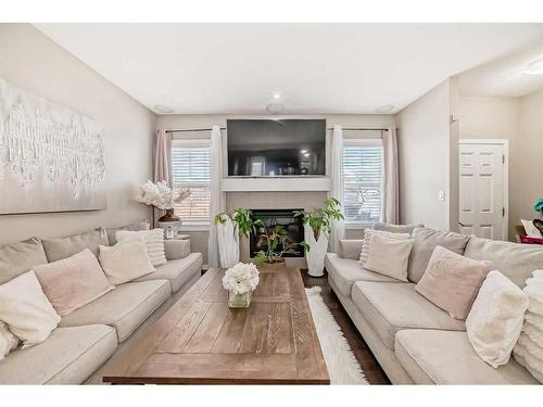 2034 New Brighton Park Se, Calgary, AB - Indoor Photo Showing Living Room With Fireplace