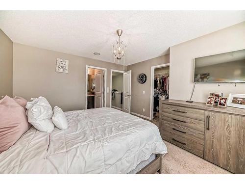 2034 New Brighton Park Se, Calgary, AB - Indoor Photo Showing Bedroom