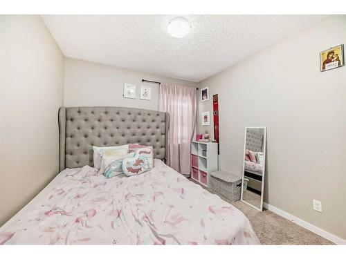 2034 New Brighton Park Se, Calgary, AB - Indoor Photo Showing Bedroom