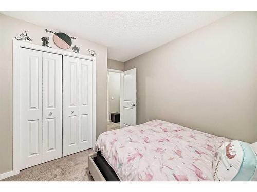 2034 New Brighton Park Se, Calgary, AB - Indoor Photo Showing Bedroom