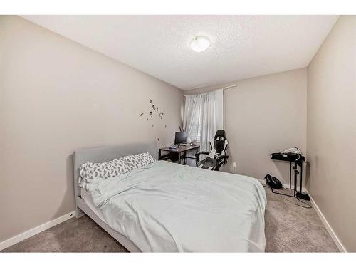 2034 New Brighton Park Se, Calgary, AB - Indoor Photo Showing Bedroom