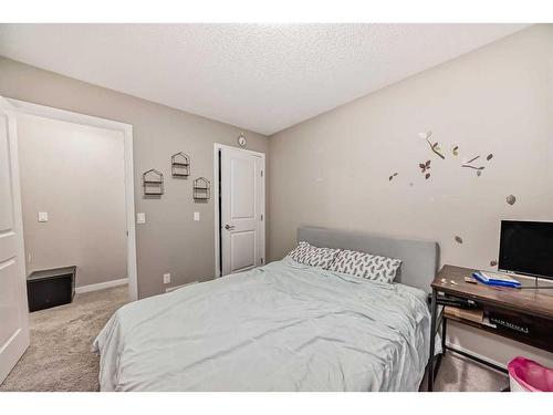 2034 New Brighton Park Se, Calgary, AB - Indoor Photo Showing Bedroom