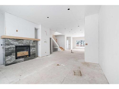 4814 70 Street Nw, Calgary, AB - Indoor With Fireplace