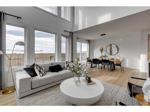 79 Dawson Wharf Mount, Chestermere, AB - Indoor Photo Showing Living Room