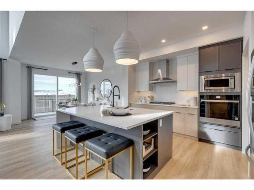 79 Dawson Wharf Mount, Chestermere, AB - Indoor Photo Showing Kitchen With Stainless Steel Kitchen With Upgraded Kitchen