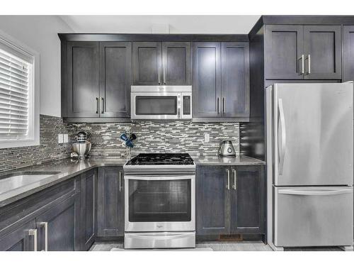 103 Evansridge Court Nw, Calgary, AB - Indoor Photo Showing Kitchen With Upgraded Kitchen