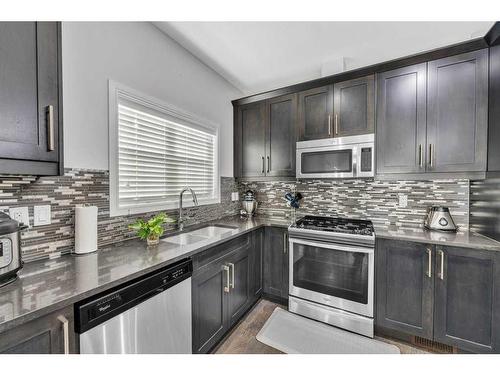 103 Evansridge Court Nw, Calgary, AB - Indoor Photo Showing Kitchen With Upgraded Kitchen