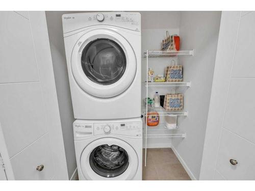 103 Evansridge Court Nw, Calgary, AB - Indoor Photo Showing Laundry Room