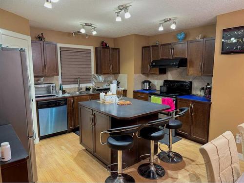 234 Saddlebrook Way Ne, Calgary, AB - Indoor Photo Showing Kitchen With Double Sink