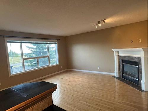 49 Citadel Estates Terrace Nw, Calgary, AB - Indoor Photo Showing Other Room With Fireplace