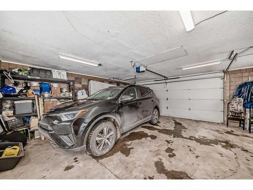 5555 5 Avenue Se, Calgary, AB - Indoor Photo Showing Garage