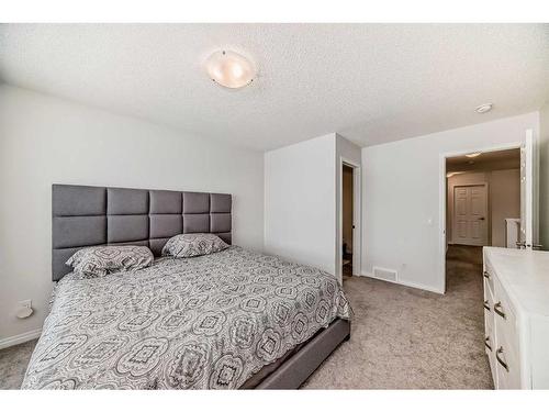 144 Lucas Street Nw, Calgary, AB - Indoor Photo Showing Bedroom