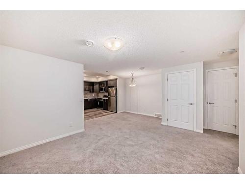 144 Lucas Street Nw, Calgary, AB - Indoor Photo Showing Other Room