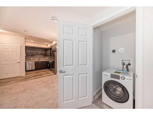 144 Lucas Street Nw, Calgary, AB - Indoor Photo Showing Laundry Room