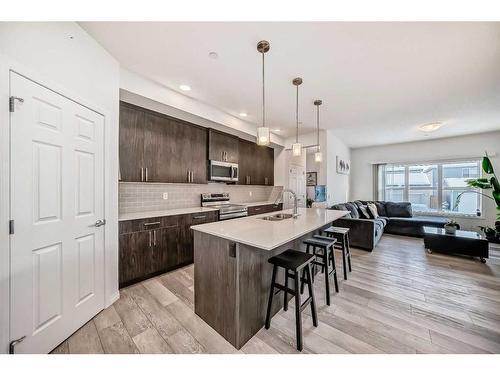 144 Lucas Street Nw, Calgary, AB - Indoor Photo Showing Kitchen With Upgraded Kitchen